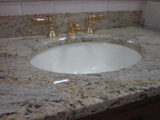 Beveled edge on countertop sink bowl